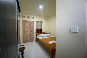 Capital O 93124 Lombok Northis Homestay - Habitación