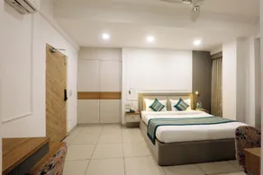 Hotel Emerald Suites By Aura - Chambre