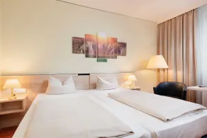 NOVINA HOTEL Südwestpark - Chambre