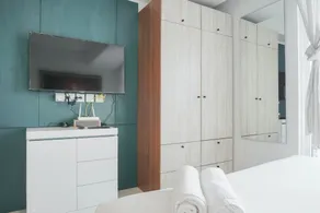 Minimalist Studio Room with City View at West Vista Apartment By Travelio - Zimmer