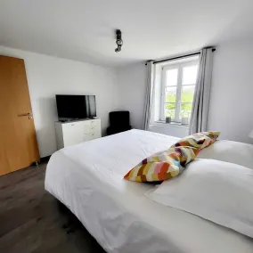 Gîte de Chérisey avec jardin - Chambre
