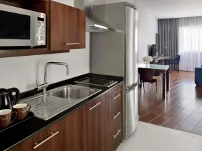 Mövenpick Hotel Apartments Al Mamzar Dubai - Chambre