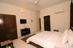 Geetanjali Luxury Suites - Quarto