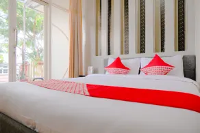Hotel Tiara Family Residence Batu by NAP - Chambre