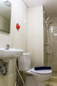 Relaxing 2BR Apartment at M-Town Residence By Travelio - Bathroom