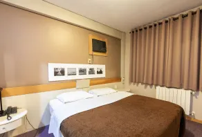 Tri Hotel & Flat Caxias - Habitación
