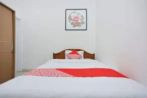 OYO 634 Elga Sastro Inn Syariah - Værelse