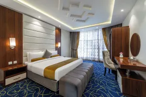 Al Qasr Hotel Suites - Albadie District  - Værelse