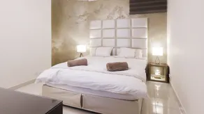 Suite de luxe au bord de la piscine - Chambre