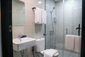 Commodious Hotel Kupang - Salle de bain