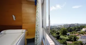 Colón Tuy - Vista do quarto