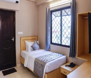 Hotel Vinayaga Tiruppur - Chambre