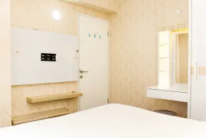 Comfort Living 1BR at Grand Sentraland Karawang Apartment By Travelio - Room