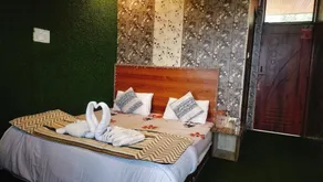Hotel Nirbana Heights - Chambre