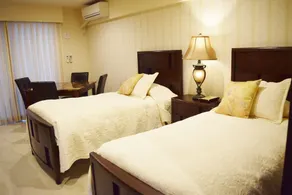 Wisteria Condominium Resort - Chambre