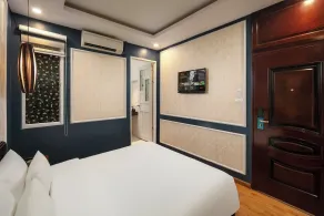 Delica Premium Hotel - Chambre