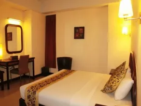 Losari Beach Hotel - Chambre