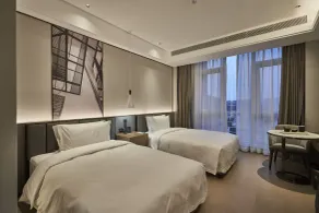 Qing Dao bu ke bu zhu hotel - Camera