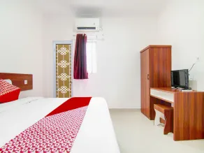 OYO 91301 Lewis Dc Guesthouse - Habitación