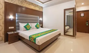 Treebo Premium Grand Legacy Elite with Roof Top Cafe - Room