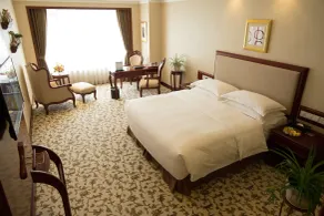 Enrichee Gloria Plaza Hotel Qingdao - Zimmer