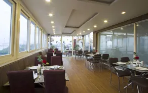 Trimrooms Palm D'or - Restaurante