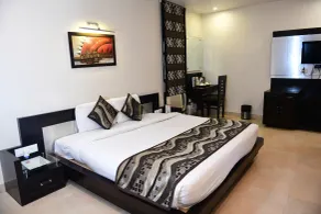 Hotel Ravisha Continental - Chambre