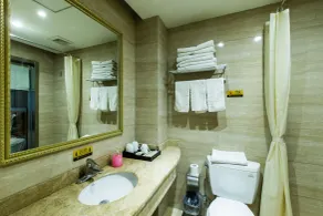 Weihai Huakun Hotel - Badezimmer