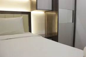 Pleasant 2BR at Grand Asia Afrika Apartment By Travelio - Room
