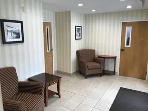 Rosemont Suites - Coin salon dans le hall