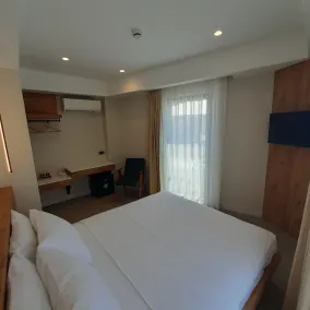 Nilus Urla - Habitación