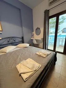 Stella Nomikou Apartments - Chambre