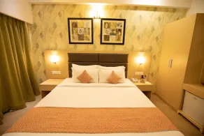 Tripli Hotels Shourya Residency - Quarto