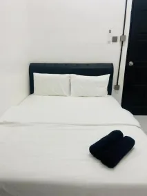 JK Roomstay - Zimmer