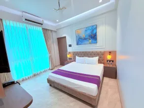 Hotel Purple Lotus Suites - Zimmer