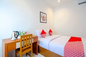 Hotel O 88 Exclusive Guesthouse - Zimmer