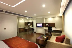 Mahagun Sarovar Portico Suites - Chambre