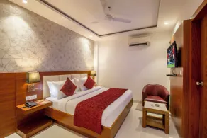 Hotel Arch Suites - Chambre