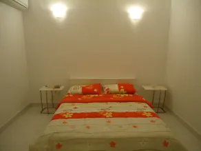 Red Door Apartments - Habitación