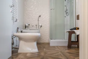 Kairos Hotel - Badezimmer
