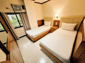 Puerto de San Juan Beach Resort Hotel and Residences - Chambre