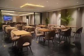 Melange Hotel - Golf course road - Restaurant