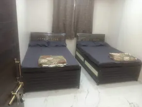 Hotel Kulswamini Inn - Room
