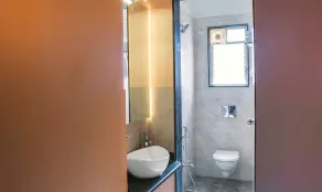 Treebo Naunidh Suites - Badezimmer