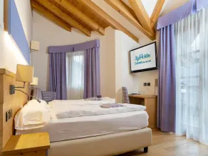 Alpholiday Dolomiti Wellness & Family Hotel - Vista do quarto