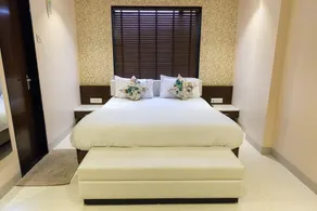 Hotel Sangat Regency - Chambre