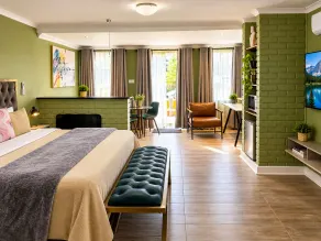 Room 1 of 8 Cozy Suites at The Hilltop Guesthouse - Zimmer