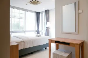 Cozy 2BR at Empyreal Epicentrum Apartment By Travelio - Rum