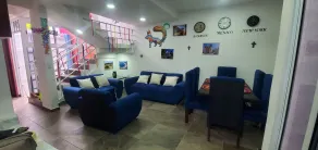 Hostal Guelaguetza Danza de la Pluma - Lobby sitting area