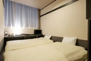 The Premium Hotel In Rinku - Chambre